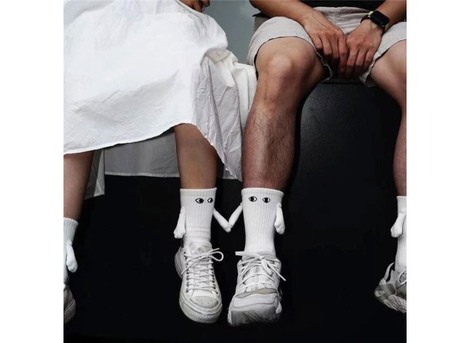 Hand Holding Socks